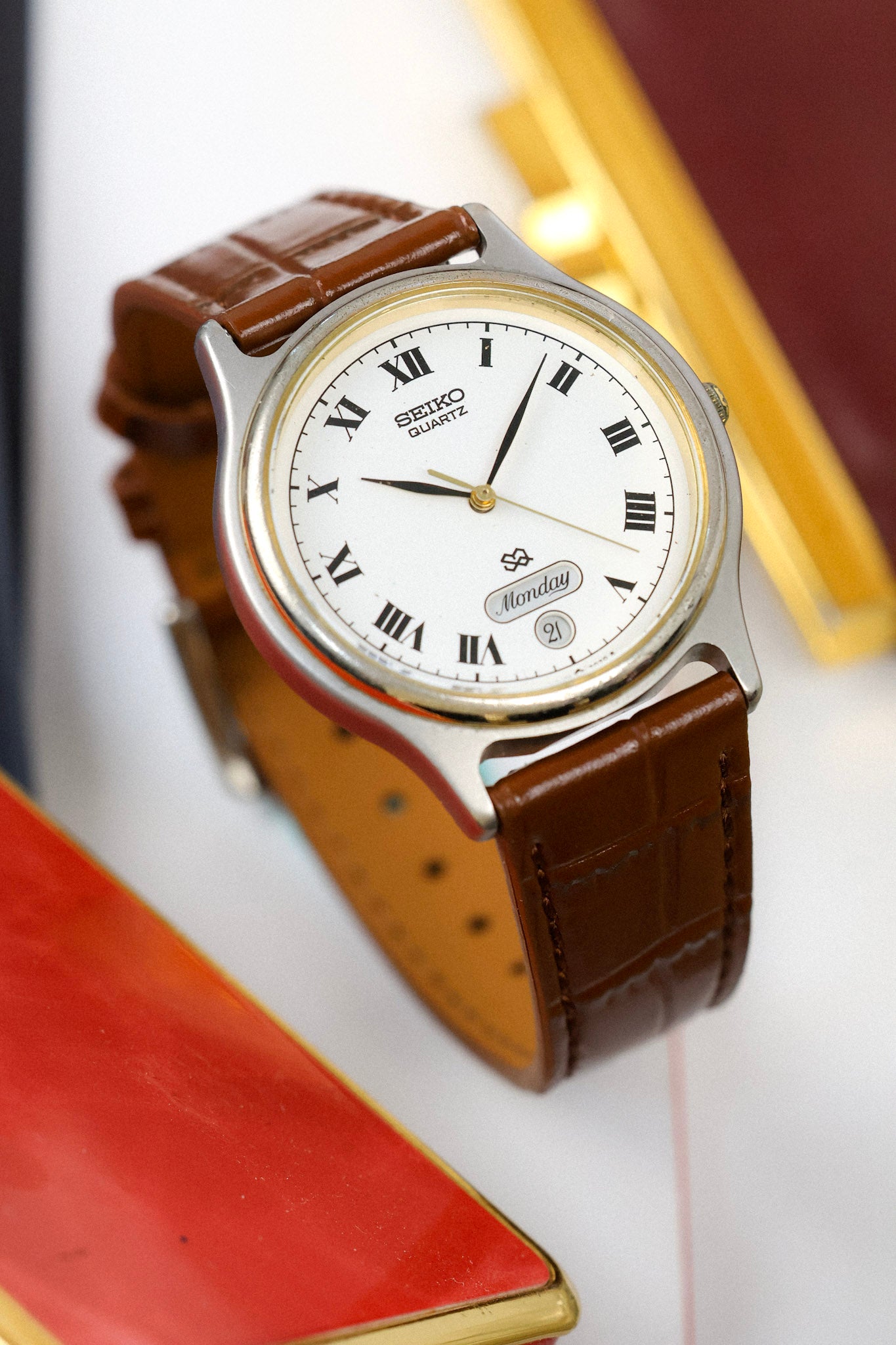 日本の時計の歴史 英語 seiko 英語 1988 Seiko SQ Two Toned Roman Script Day-Date (English Days of the
