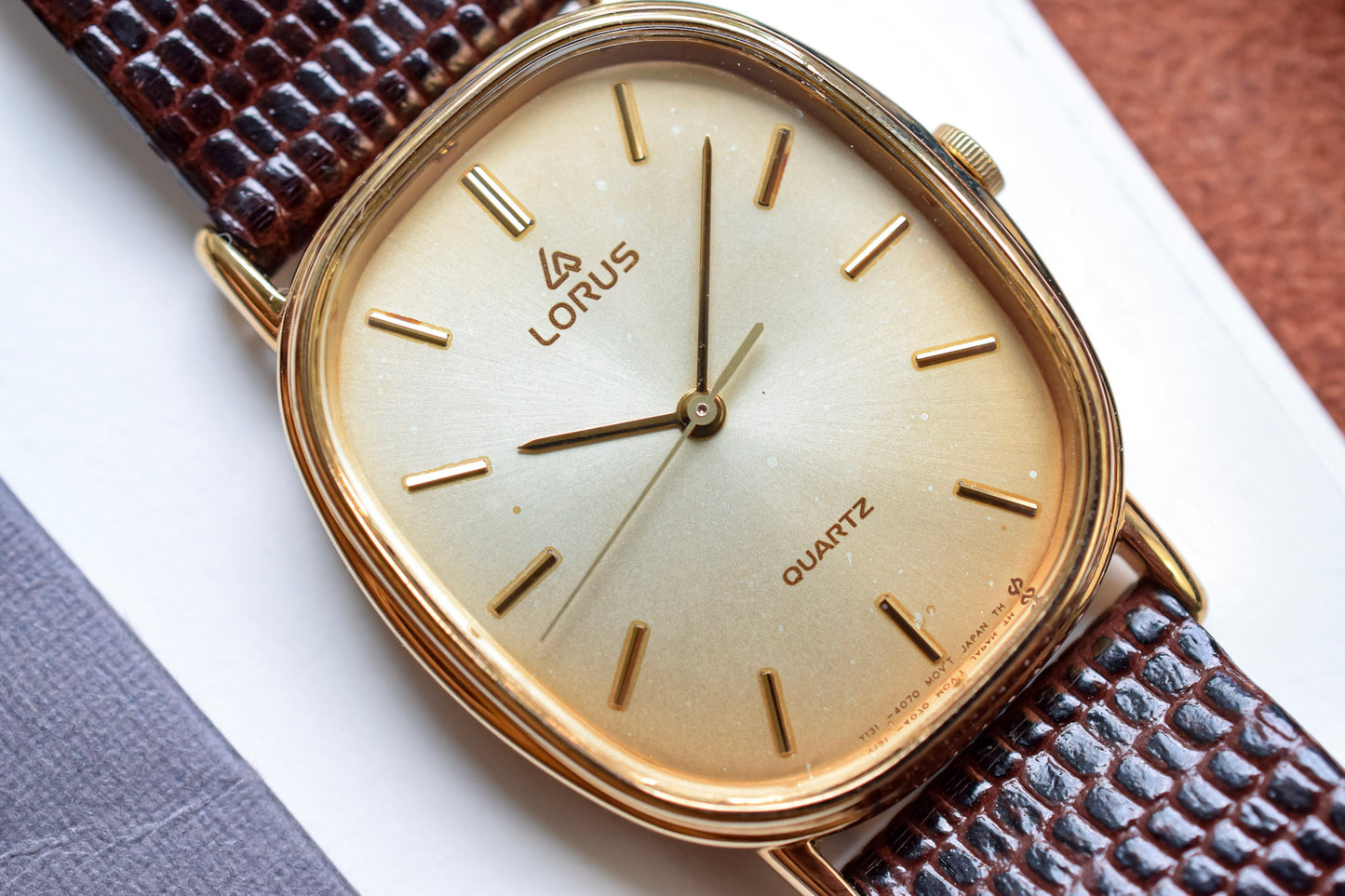 1980s Lorus Sunray Patina Champagne Ellipse