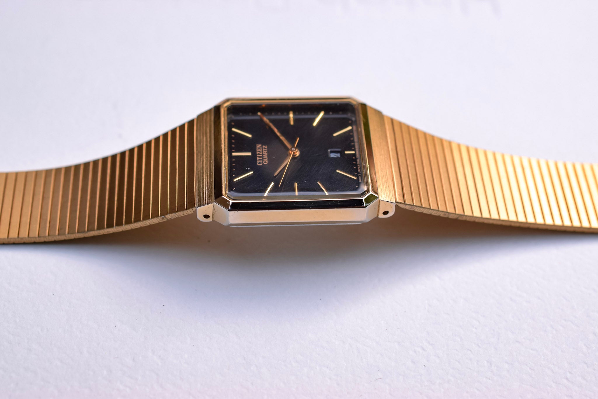 Citizen gold best sale watch square