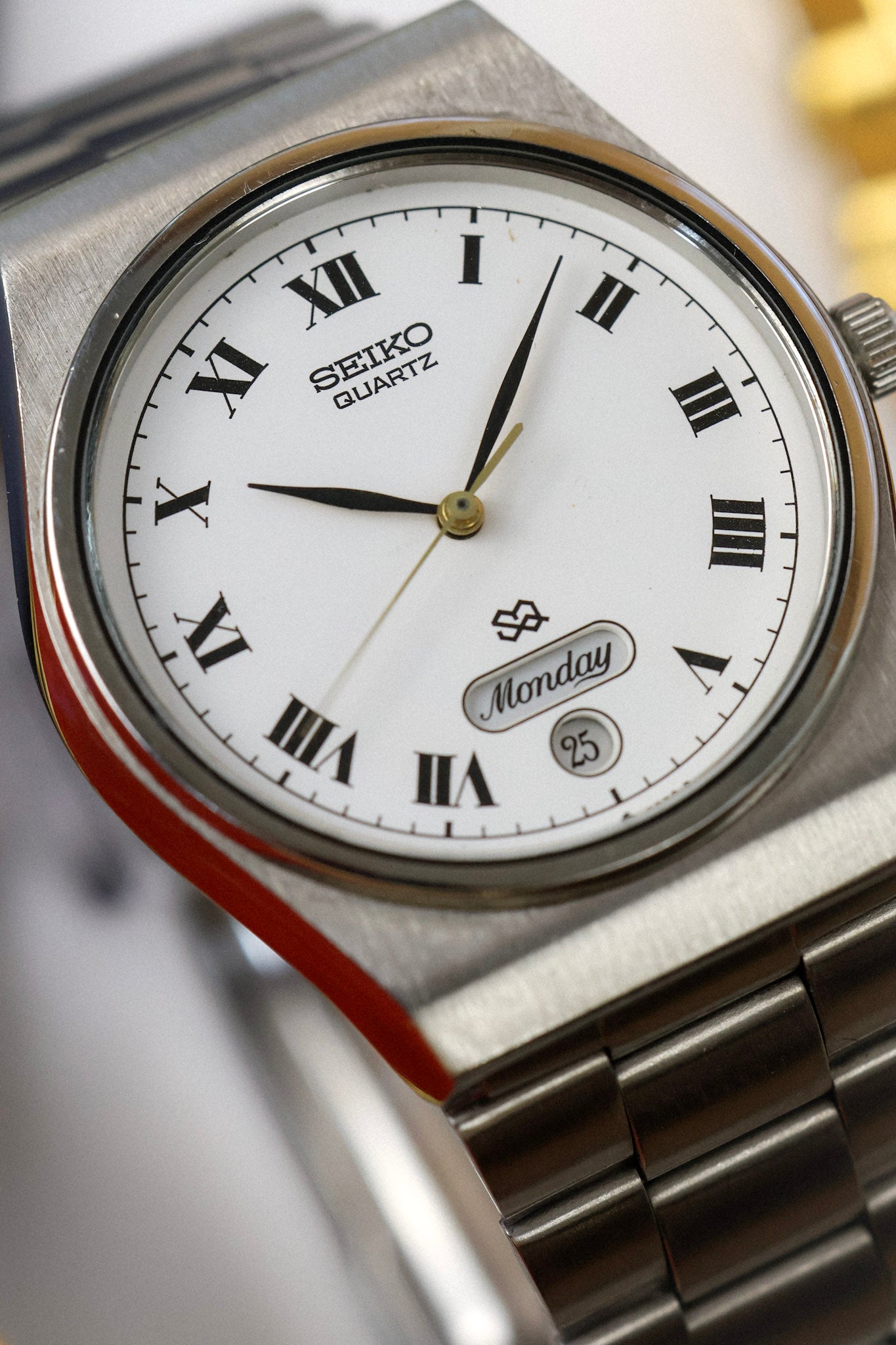 1990 Seiko SQ Steel Roman Script Day-Date – Oldtimer Watch Shop
