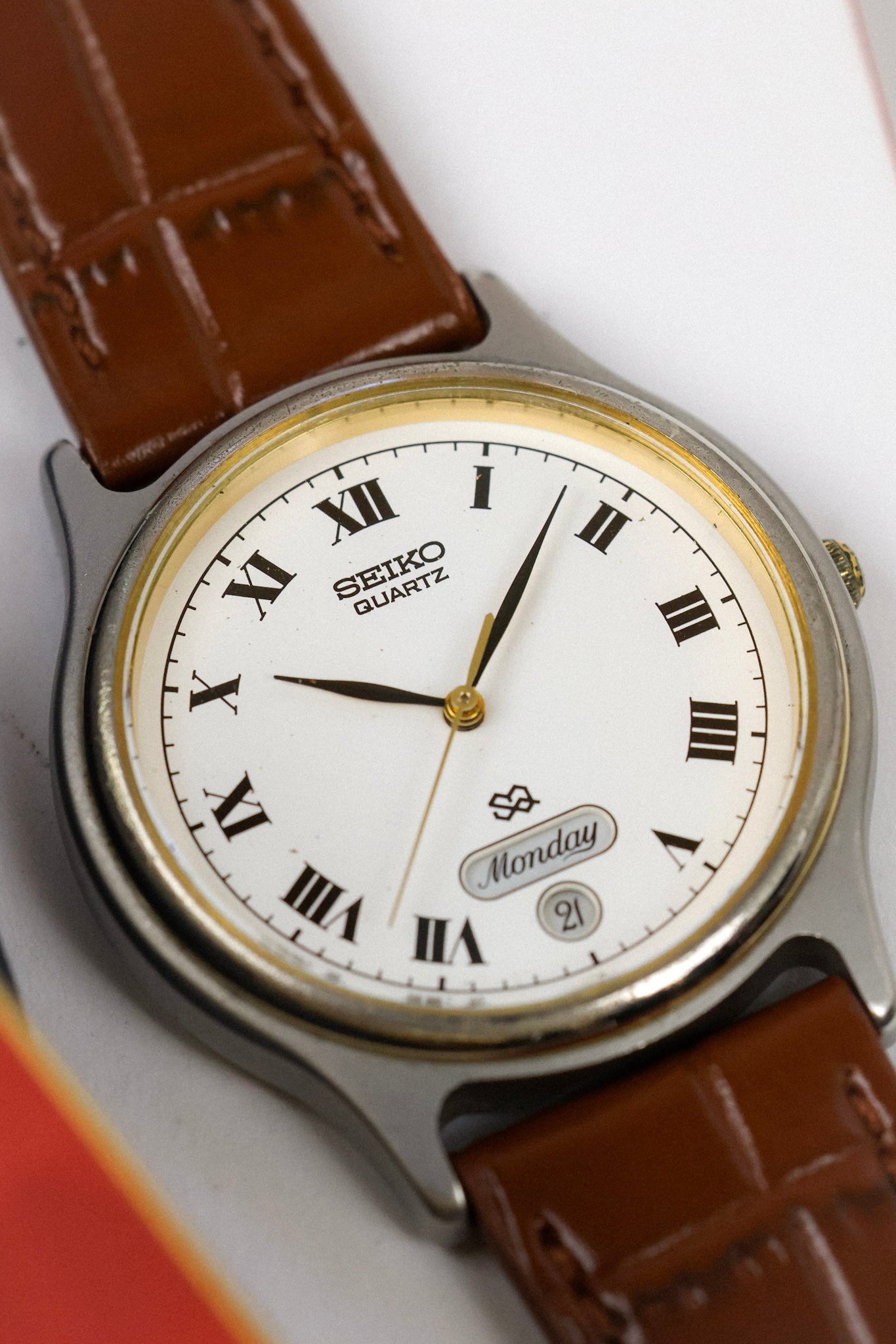 1988 Seiko SQ Two Toned Roman Script Day-Date (English Days of the Week)