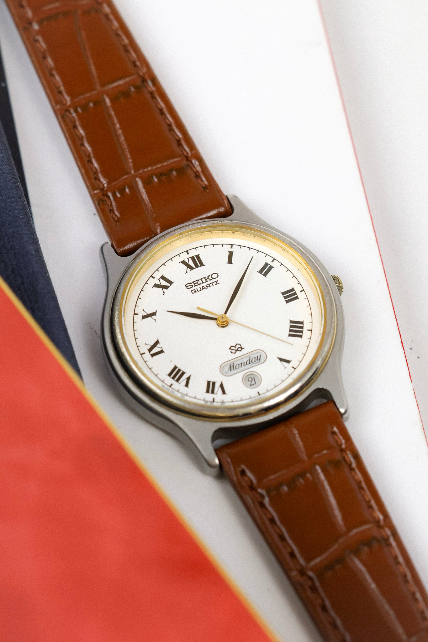 1988 Seiko SQ Two Toned Roman Script Day-Date (English Days of the Week)