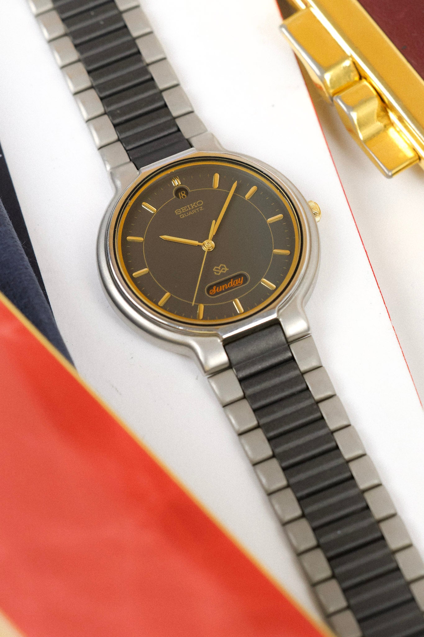 1997 Seiko SQ Graphite Script Font Day-Date