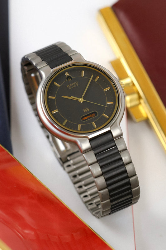 1997 Seiko SQ Graphite Script Font Day-Date