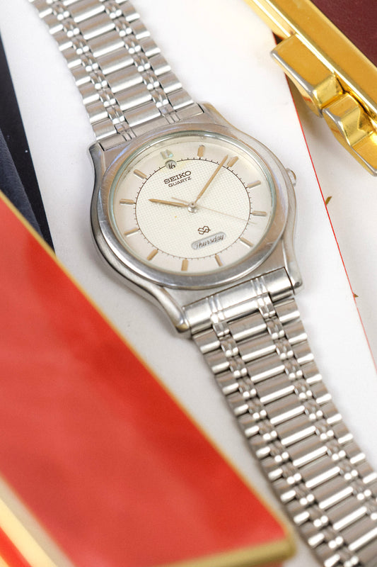 1988 Seiko SQ Geometric Script Font Day-Date